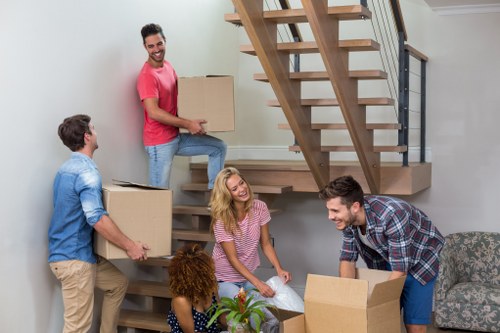 Professional packing materials and boxed household items in an Enfield home move