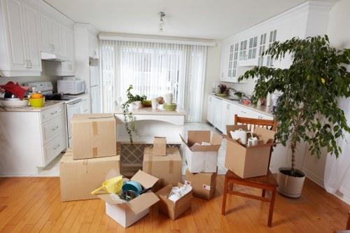 Boxes and furniture prepared for a man and van removal in Enfield