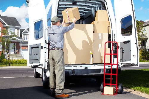 Removal crew using PPE and safety checks during a professional move