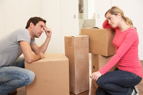 Team handling bulky household furniture for removal in Enfield