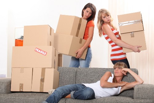 Packed furniture and household items ready for relocation in Enfield