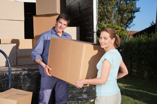 Local removal team managing boxes and furniture